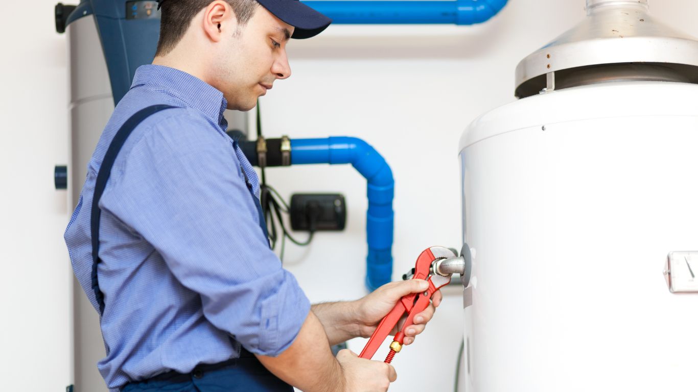 Technician performing routine geyser maintenance in Durban